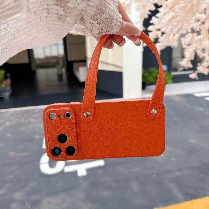 Capa De Couro Genuíno Para Iphone 16 (laranja) Com Alça De Pulso, Resistente A Impactos E Portátil.