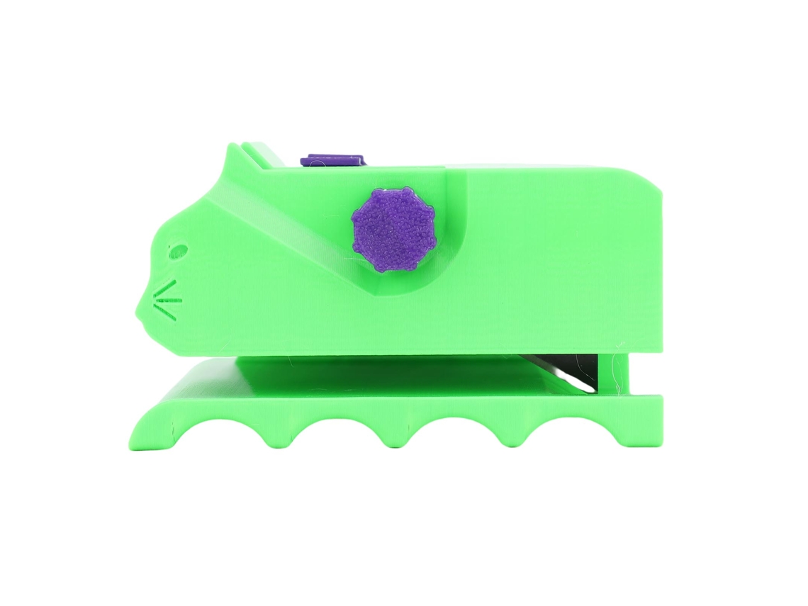 Cortador de papel com comprimento ajustável de 3 cm a 5 cm, equipado com um compartimento para folhas salientes.