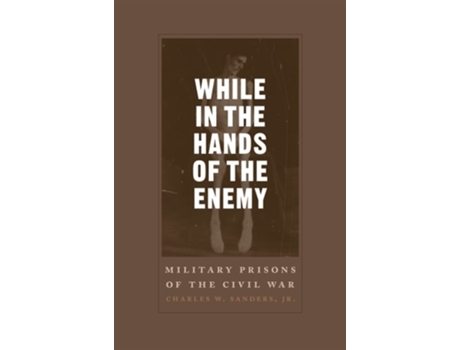 Livro While In The Hands Of The Enemy De Charles W Sanders Jr (inglês)