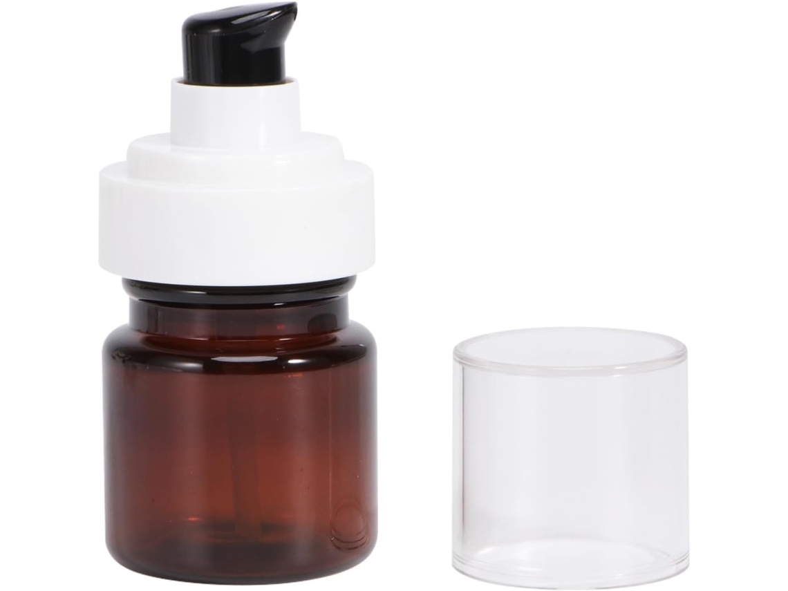 Conjunto de 3 frascos com bomba dosadora portátil de 40ml em embalagem protetora de plástico marrom.