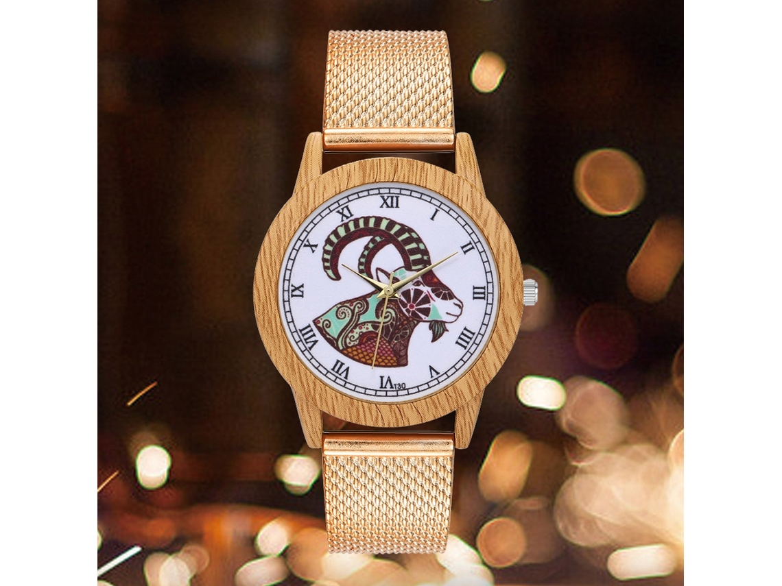 Relógio de quartzo casual unissex com pulseira de silicone na cor ouro rosa.