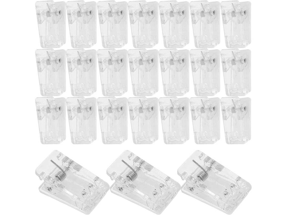 Conjunto genérico de 50 clipes plásticos autoadesivos transparentes com material Mola e ABS, ideais para fixação.