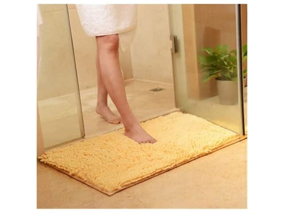 Tapete de banho antiderrapante feito de microfibra de chenille macia, absorvente e lavável na máquina.