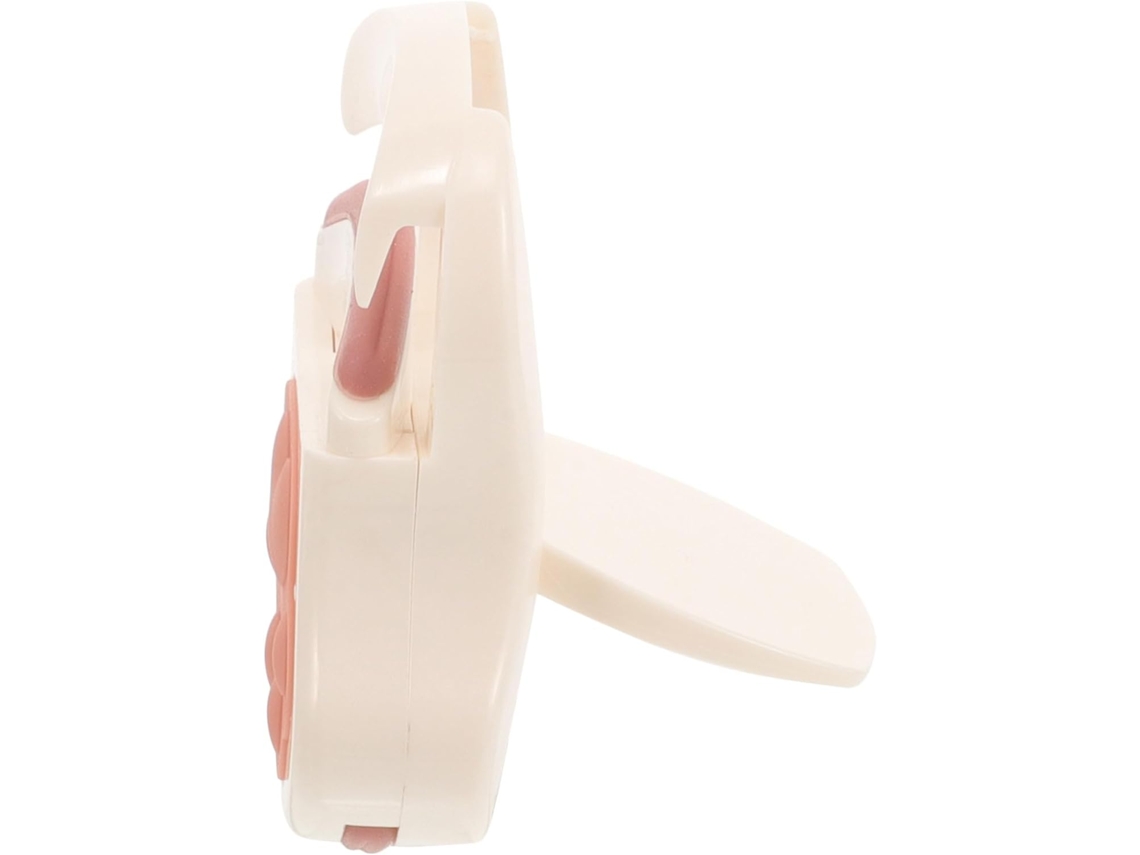 Modelador Cilio portátil em formato de unha de gato branca, feito de silicone e policarbonato.