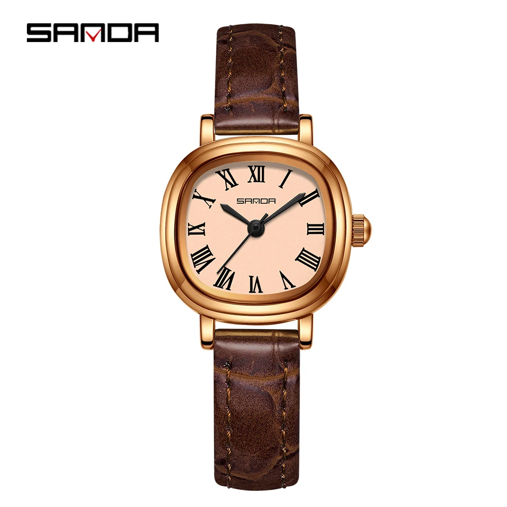 Relógio feminino de quartzo (marrom e rosa), elegante e sofisticado, com um mostrador simples em algarismos romanos.