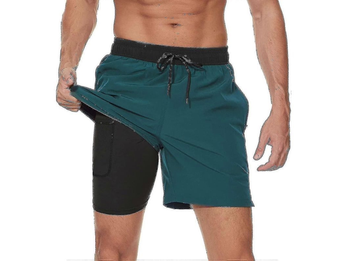 Calção de banho masculino 2026 com forro de compressão, secagem rápida 2 em 1 e bolsos com zíper, ideal para surfe e praia.