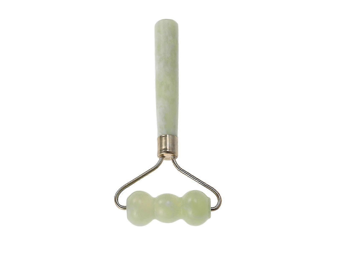 Massagem com rolo de jade para remover olheiras, relaxar e promover um lifting facial.