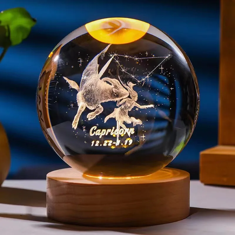 Bola de Cristal de 6,8cm com Doze Constelações, Base de Madeira com Led MDUG (capricórnio 6x6cm com Luz)