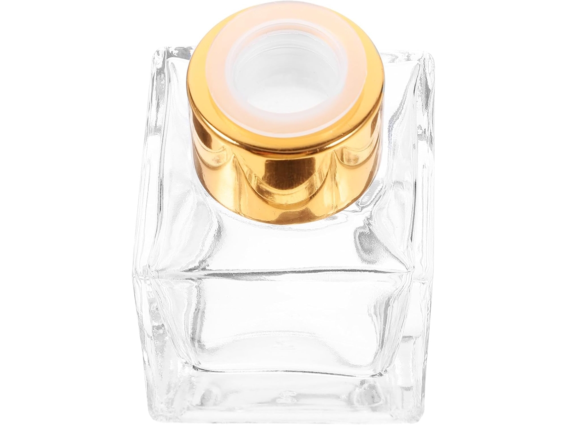 Difusor de aromas em frasco de vidro branco de 50ml, elegante e leve, perfeito para decoração de mesa.