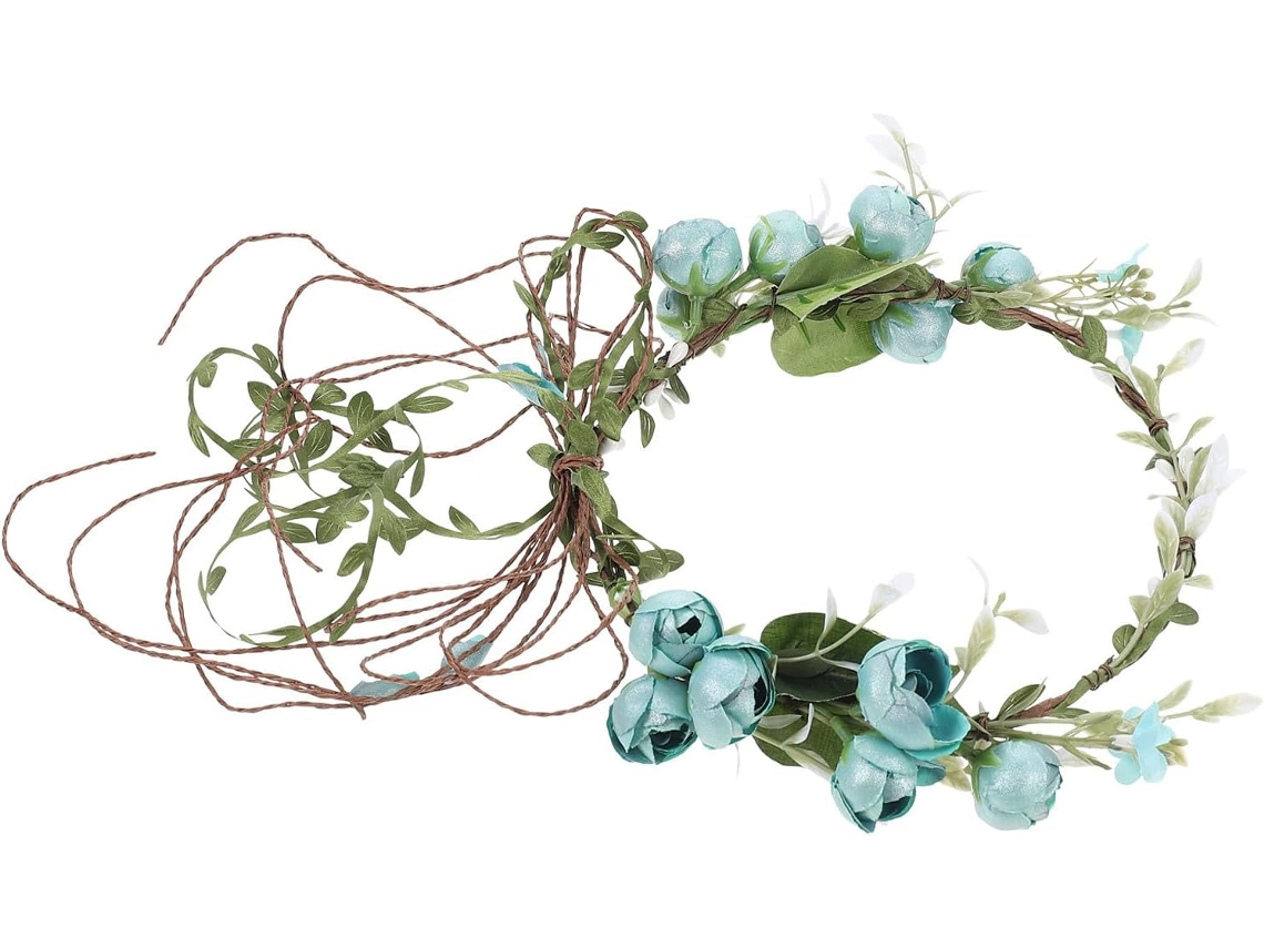 Tiara feminina azul com flores artificiais, textura leve e elegante.