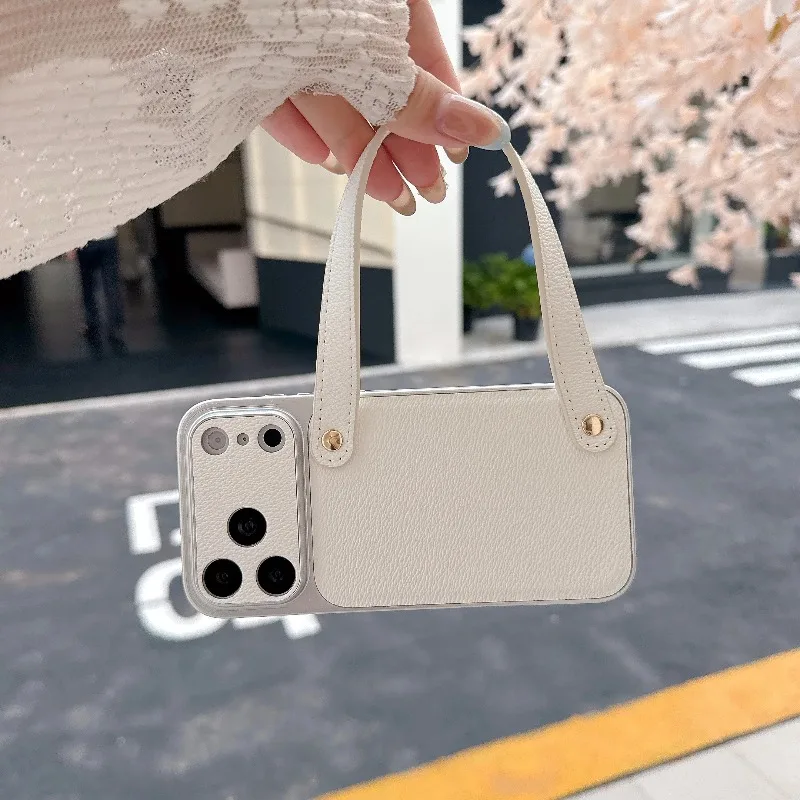 Capa Para Celular (iphone 17 Branco) Em Couro Genuíno Com Alça De Pulso, Resistente A Impactos E Portátil.