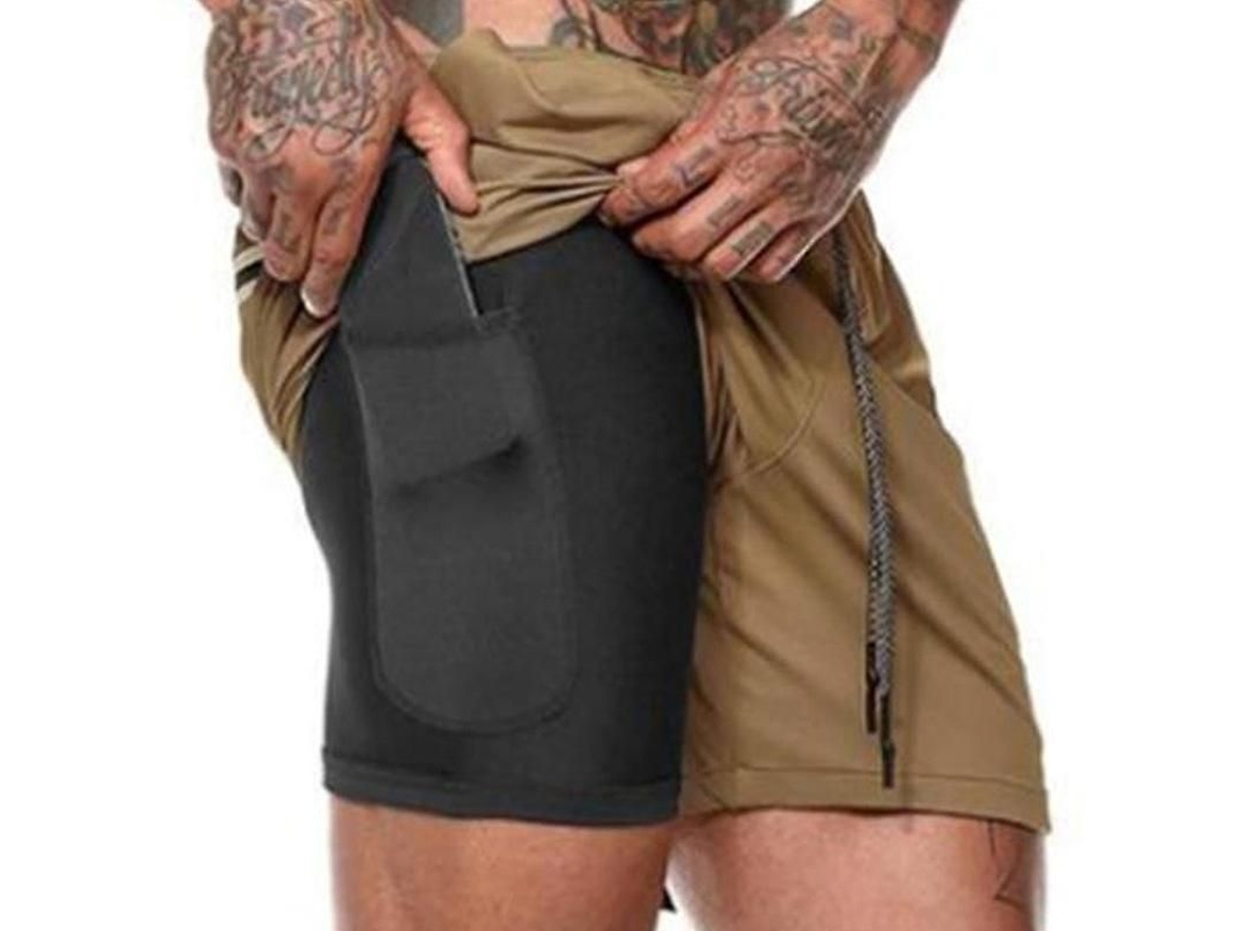 Calções desportivos masculinos 2026 com bolsos para ginásio e corrida.