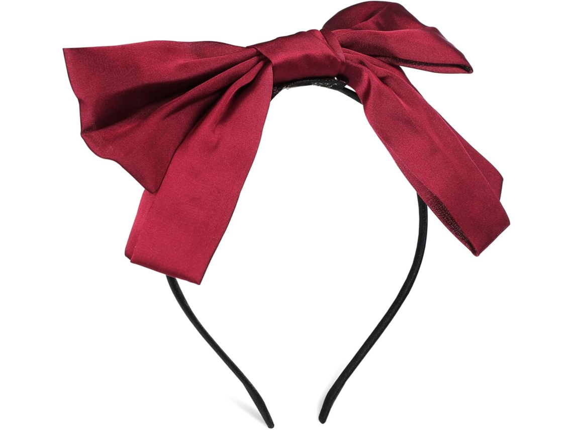 Faixa de cabelo feminina com laço grande, acessório elegante e confortável para os cabelos.