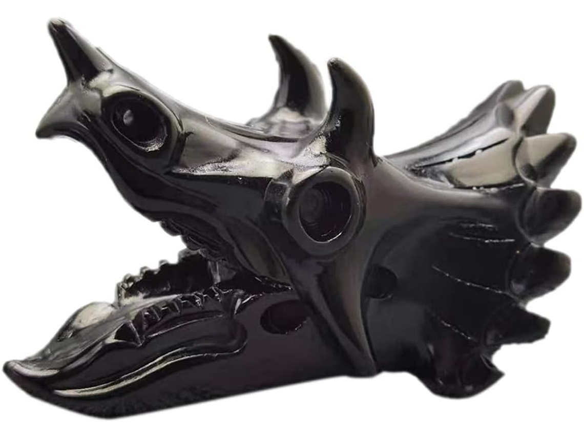 Estatueta de crânio de Triceratops em obsidiana natural, feita à mão com cristal de quartzo.