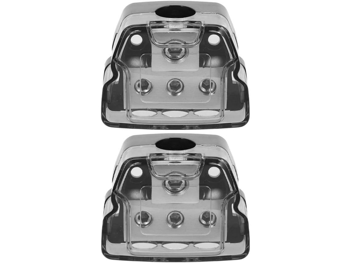 Fonte de alimentação com divisor de aterramento de duas peças para áudio automotivo.