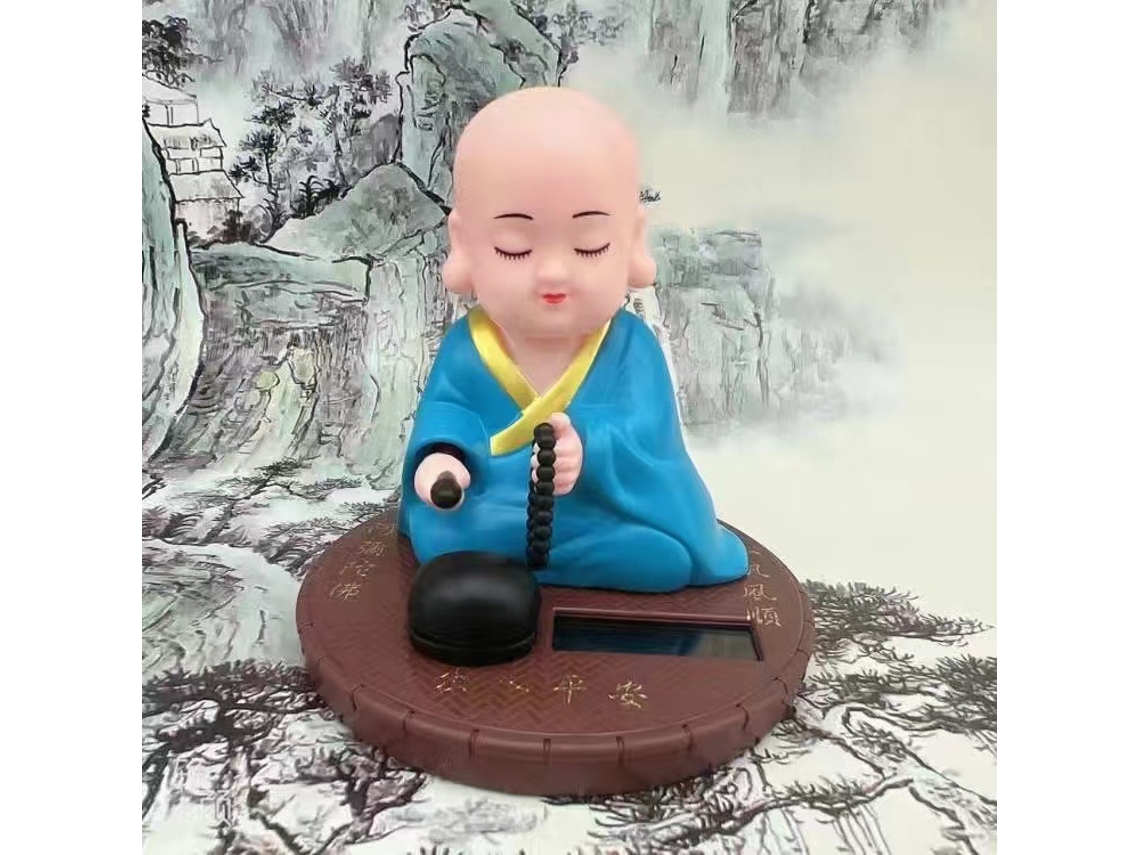 Solar Moving Head Little Monk Decoração de Carro Criativa Console Central de Carro Decoração de Interior de Carro Decoração de Casa Amarelo