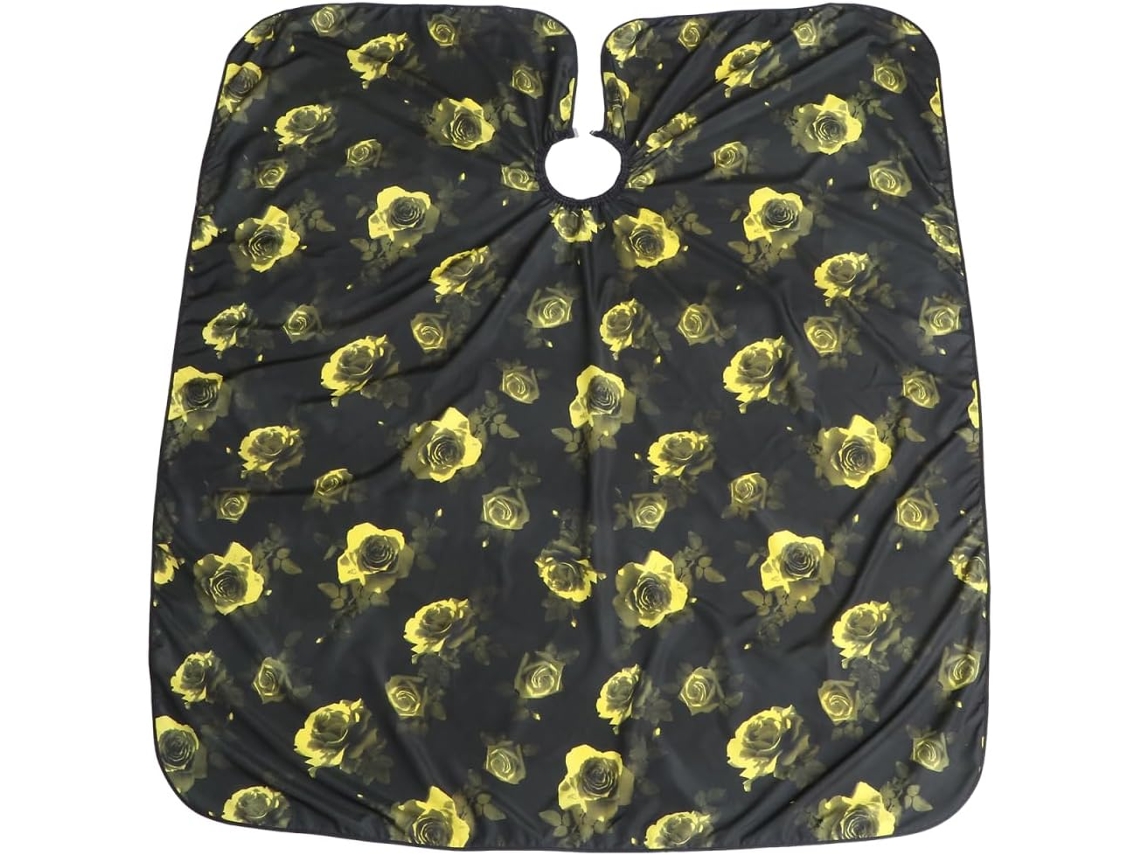 Capa impermeável em poliéster pongee amarelo com estampa rosa.