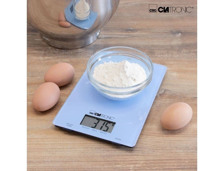 Balança de Cozinha CLATRONIC KW 3626 Azul (Capacidade: 5 Kg - Precisão: 1 g) — balança de cozinha azul, superfície em vidro, medições até 5 kg com intervalos de 1g, função reset para adição de peso. Botão On/Off