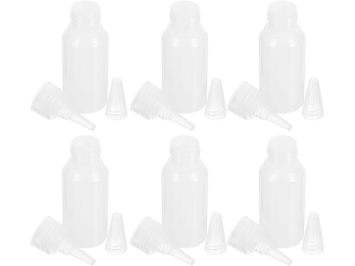 Conjunto de 6 pequenos frascos de 30ml em PE flexível com bico de precisão.