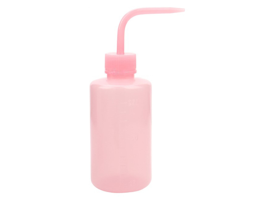 Frasco de 250ml para enxágue de cílios com vedação hermética e bico curvo.