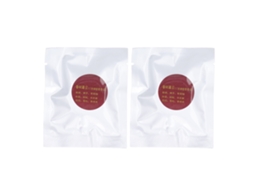 2 pastilhas de aromaterapia para carro com folha de refil em formato circular.