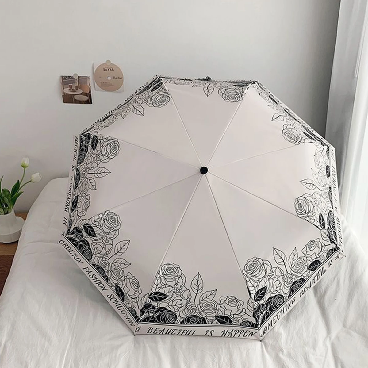 Mini guarda sol MDUG verde, com seis dobras, proteção UV, formato cápsula
