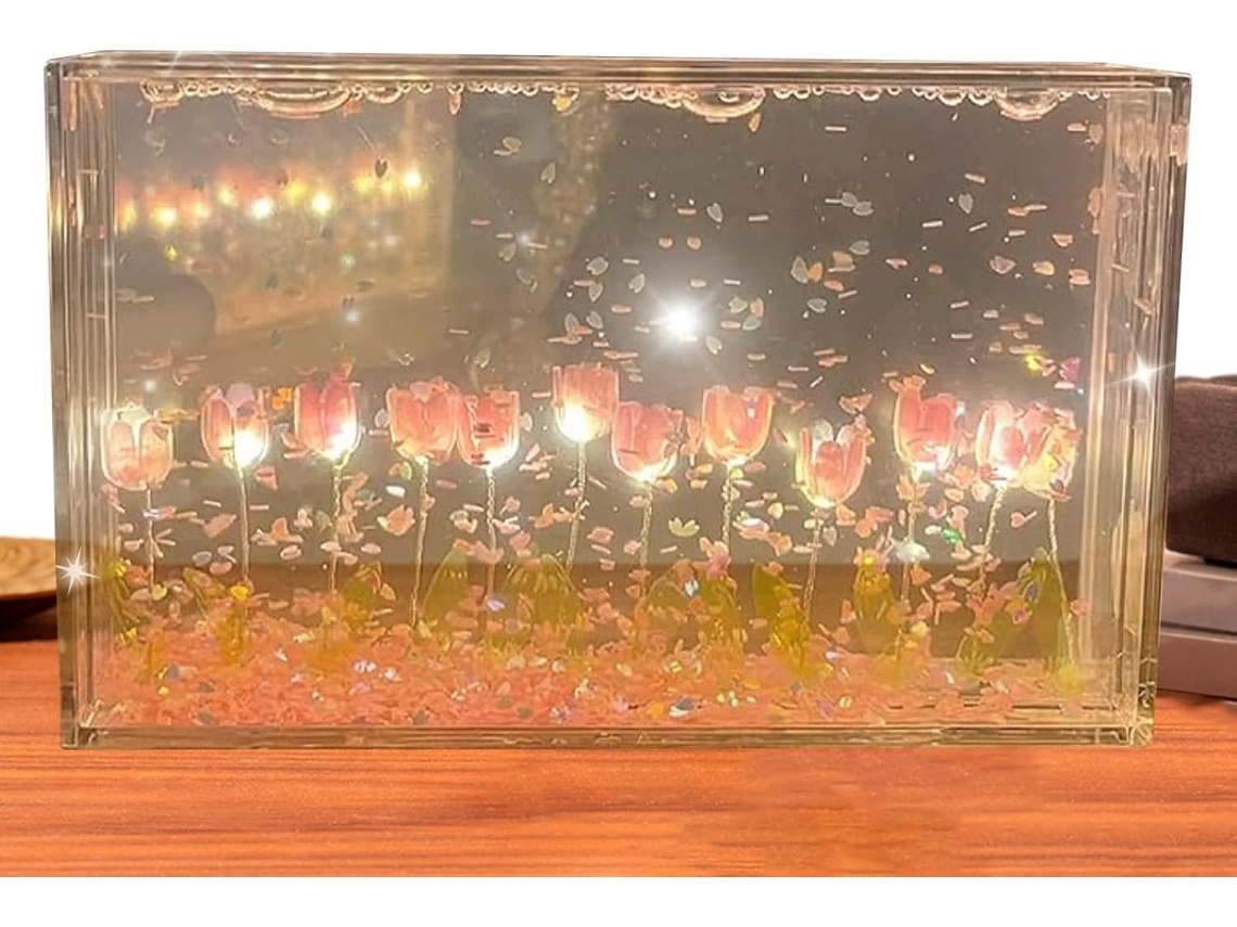 Brilho floral suave, linda iluminação decorativa com pétalas em movimento.