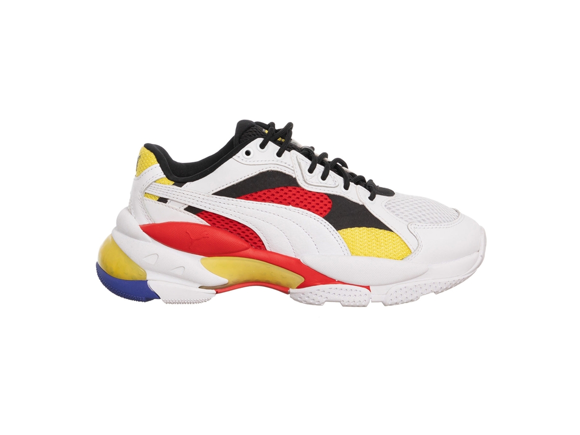 Tênis feminino Puma tamanho 36 em material sintético, conforto e estilo.