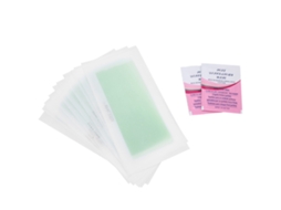 12 tiras de cera depilatória macias e flexíveis para pernas, mãos e axilas, com aroma de toranja verde.
