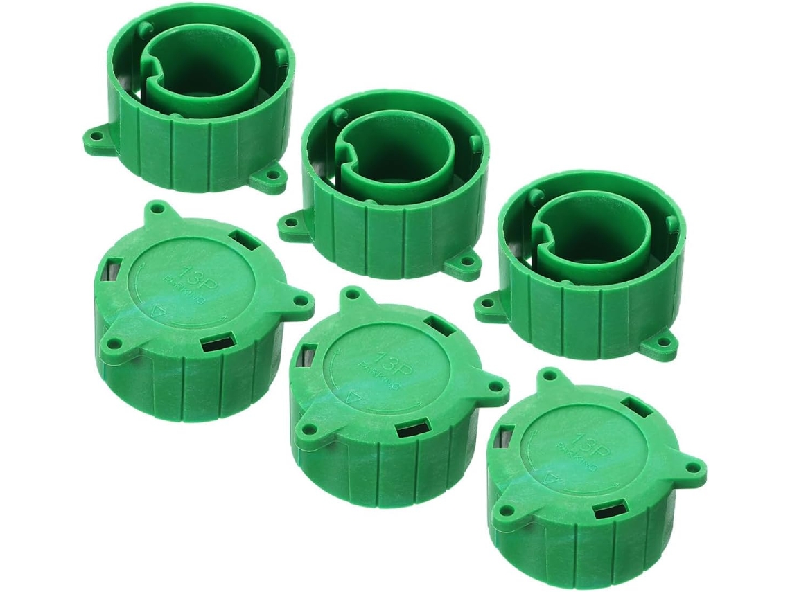 Uma tampa verde protege o adaptador de interface do plugue de plástico do conector.