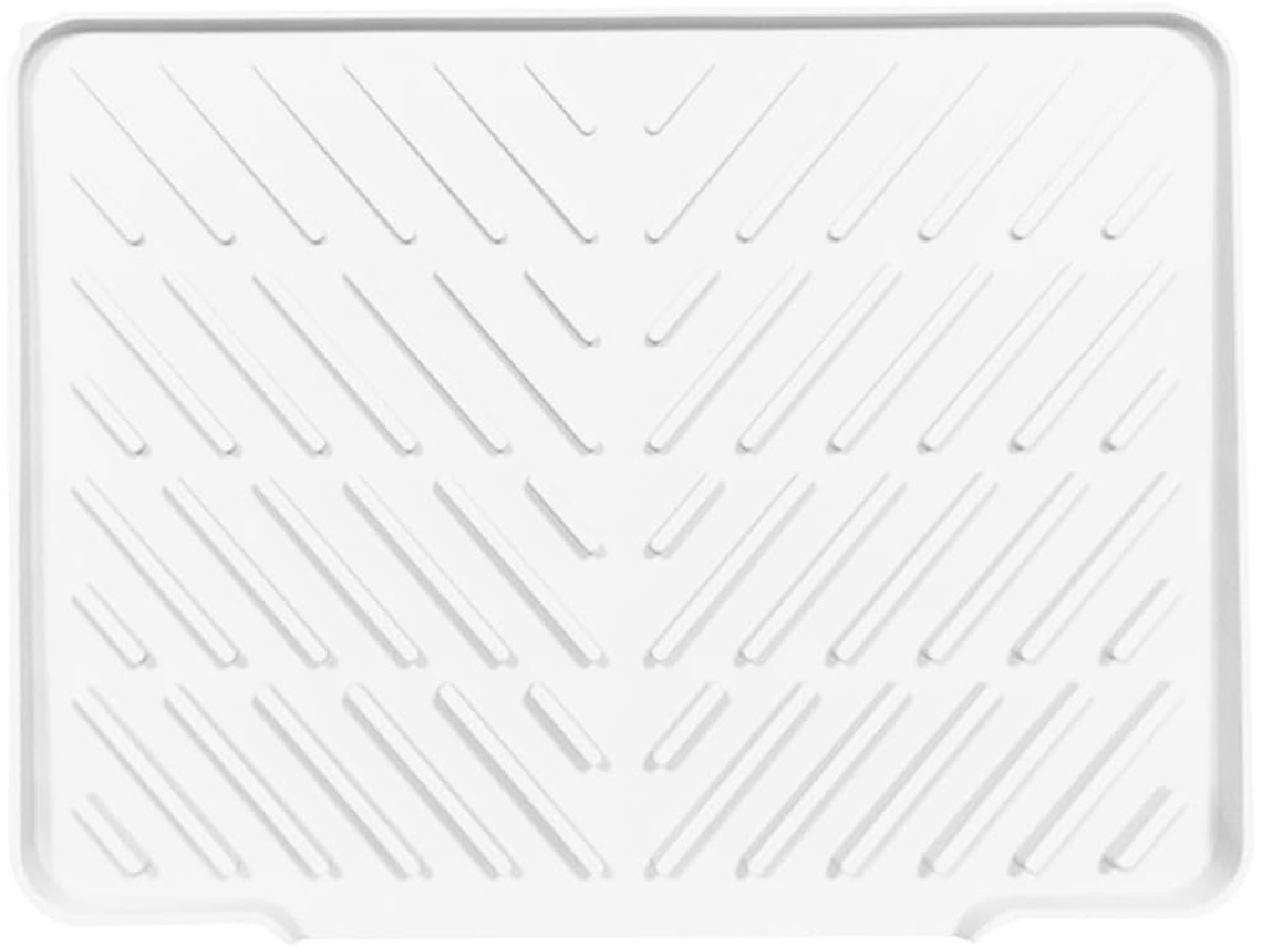 Tapete de silicone resistente ao calor com base antiderrapante e borda com drenagem para uso como louça ou escorredor.